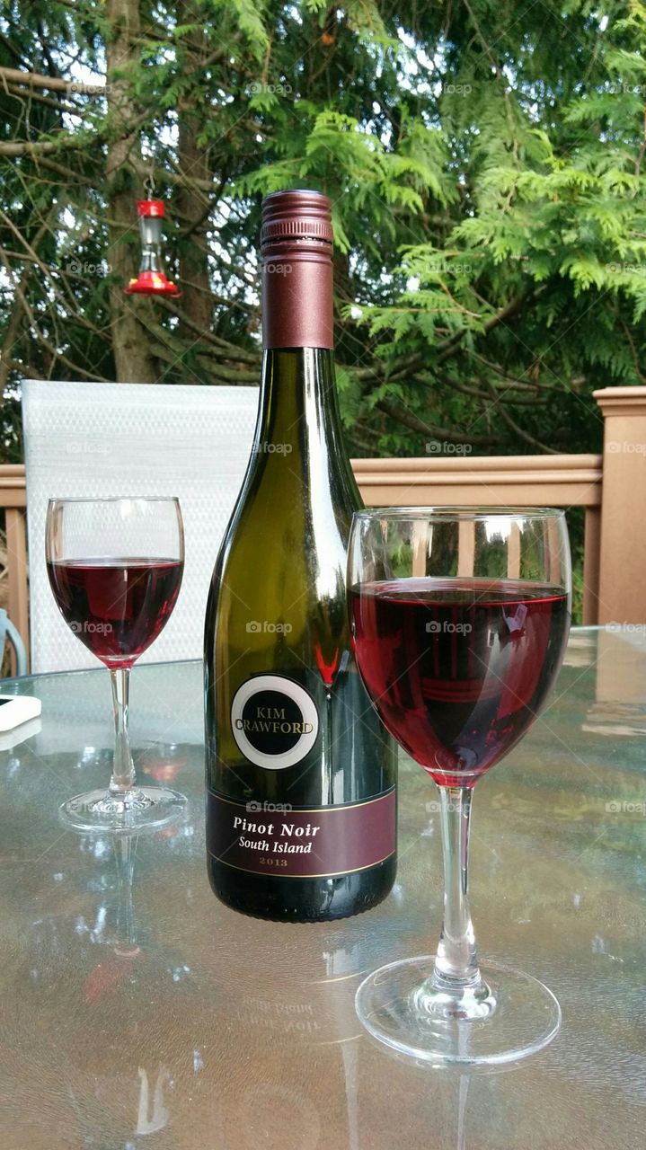 Pinot on the patio. Sharing some amazing Pinot Noir with a friend after work