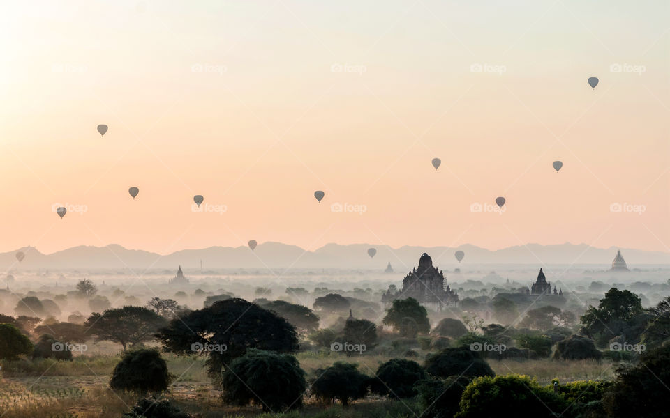 The sunrise that hits in Bagan, Myanmar in 2017, full of hot air balloons, will never forget this scene!