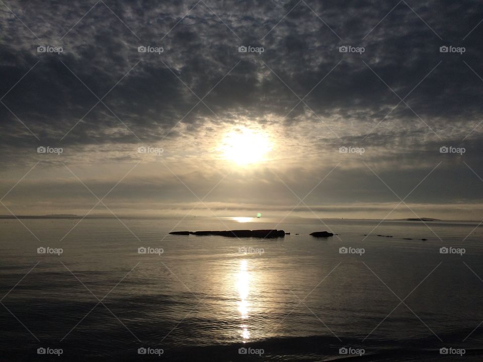 Silhouette of rock at sunset