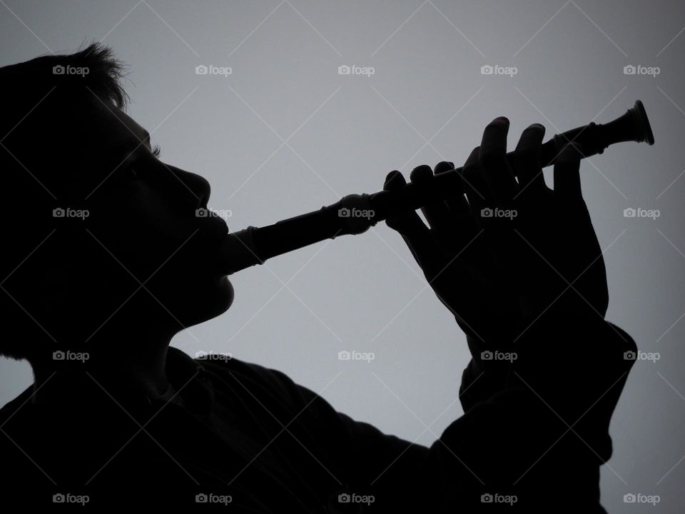 Boy playing flute