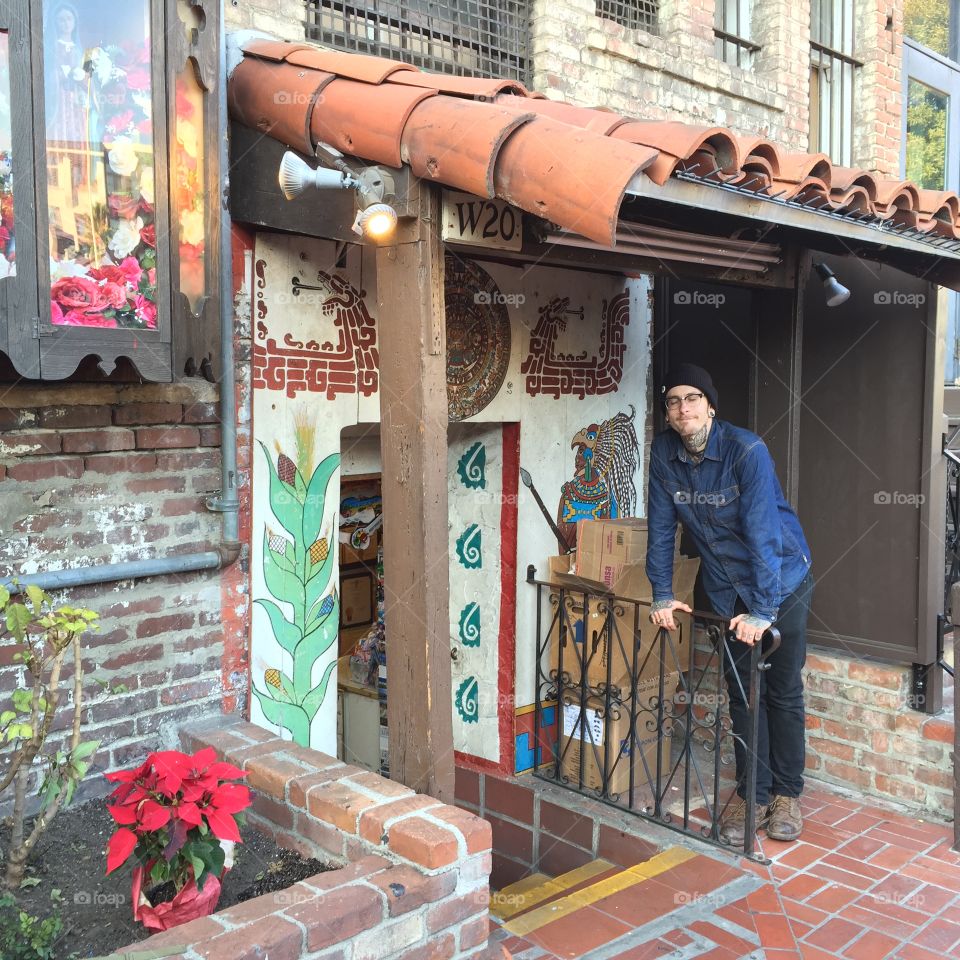 Cammeron D. Posing with beautiful painted doorway, Olvera St Los Angeles CA