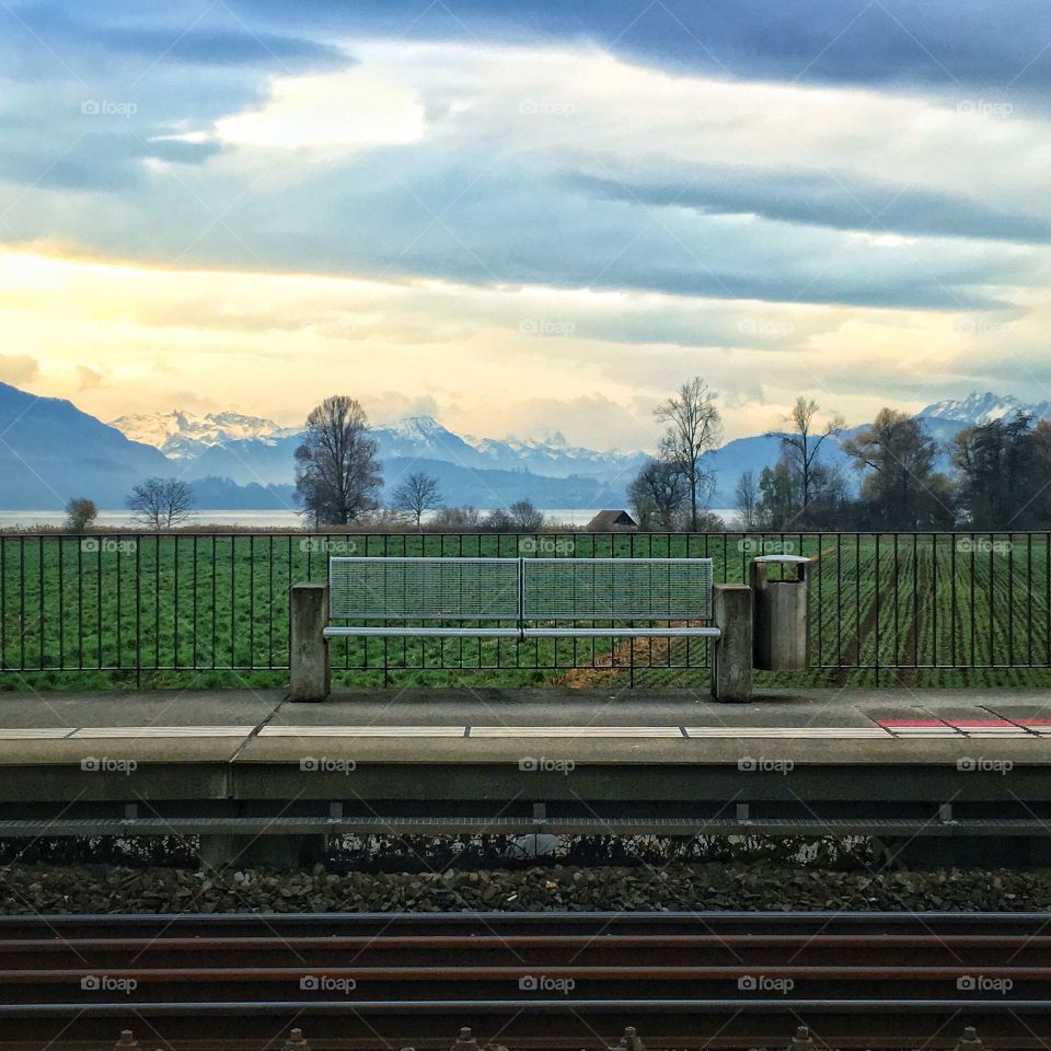 Empty bench at train station