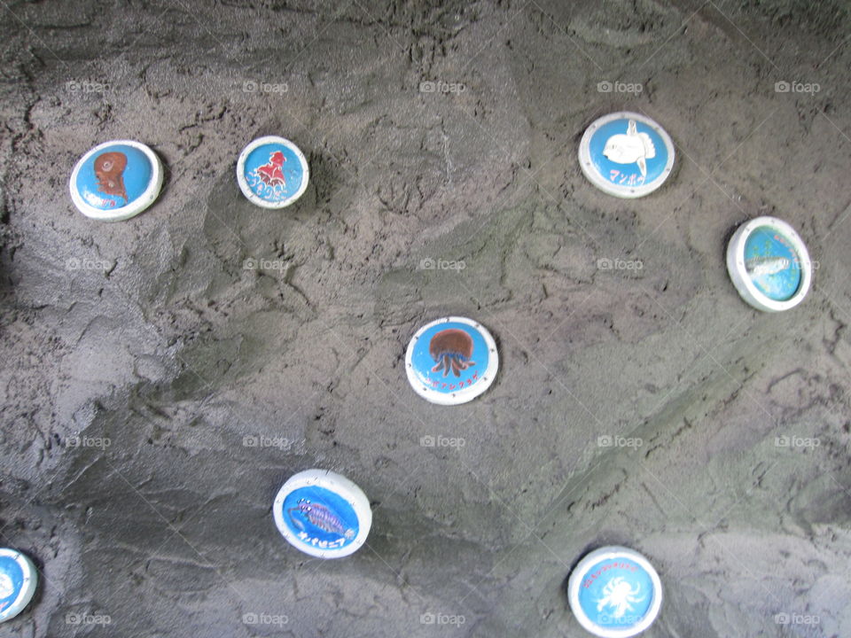 Small Cave in Hanayashiki Amusement Park, Asakusa, Tokyo, Japan. Ocean Themed Round Tiles.