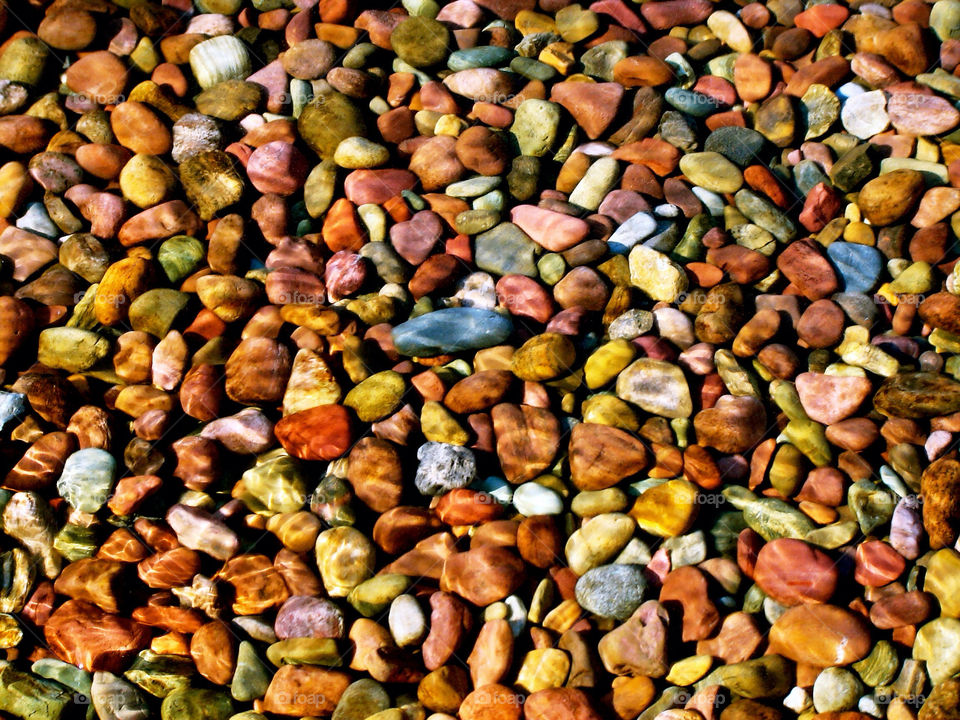 water colorful rocks rock by refocusphoto