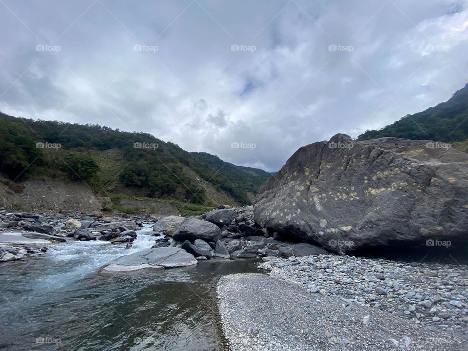 Beautiful mountain scenery and river in the valley