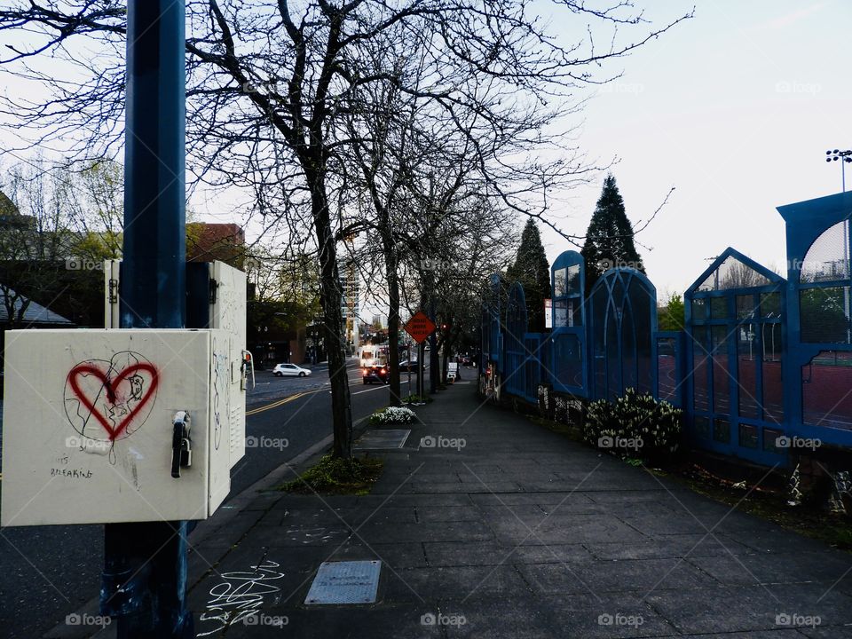 Heart of the city. Love finding little gems on walks around the city. The vibrant city behind the graffiti is beautiful.  