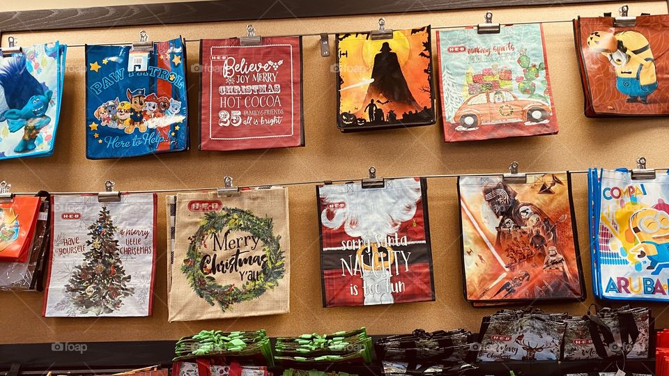 Daily grocery sacks with local designs by Large Grocery Chain Stores. 