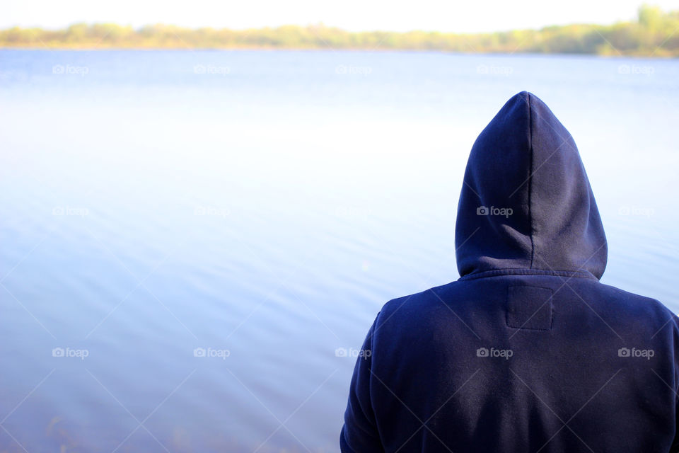 Man, hood, "man against the background of nature," "man on the background of the lake," a lake, a river. Shore, nature, forest, landscape