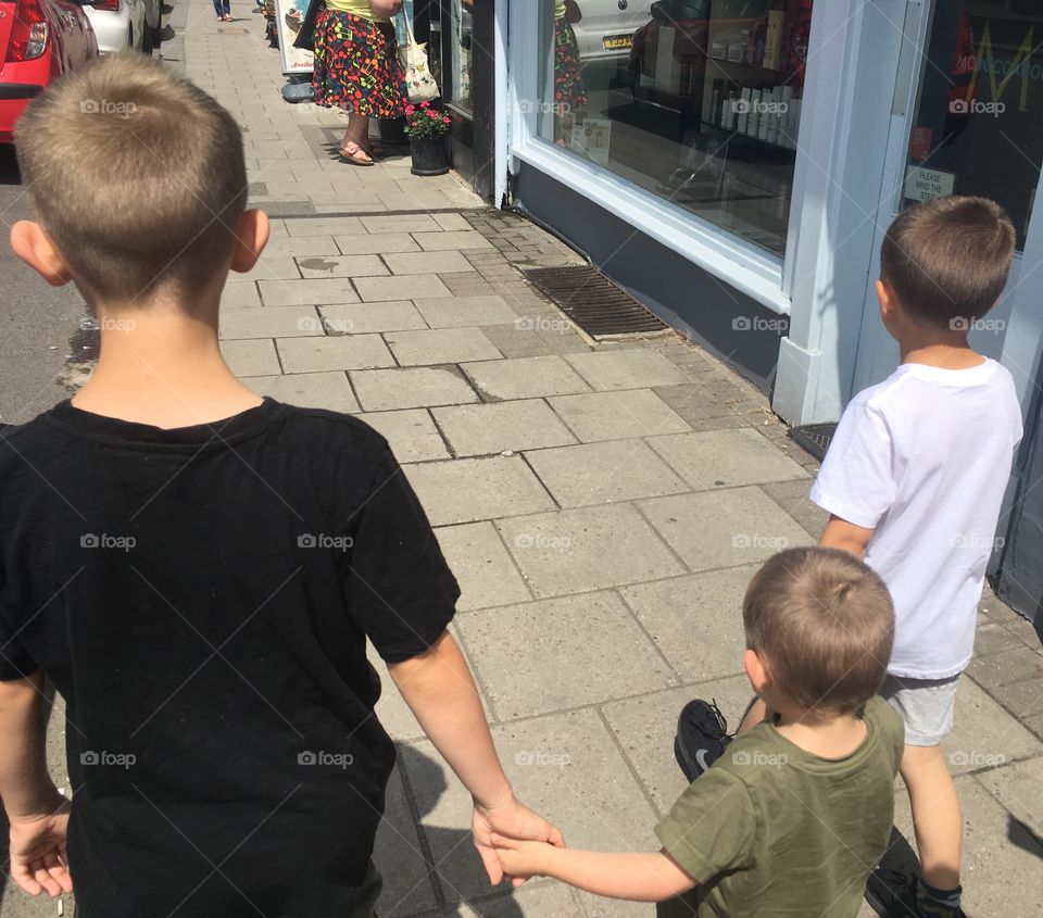 Brothers Holding Hands 