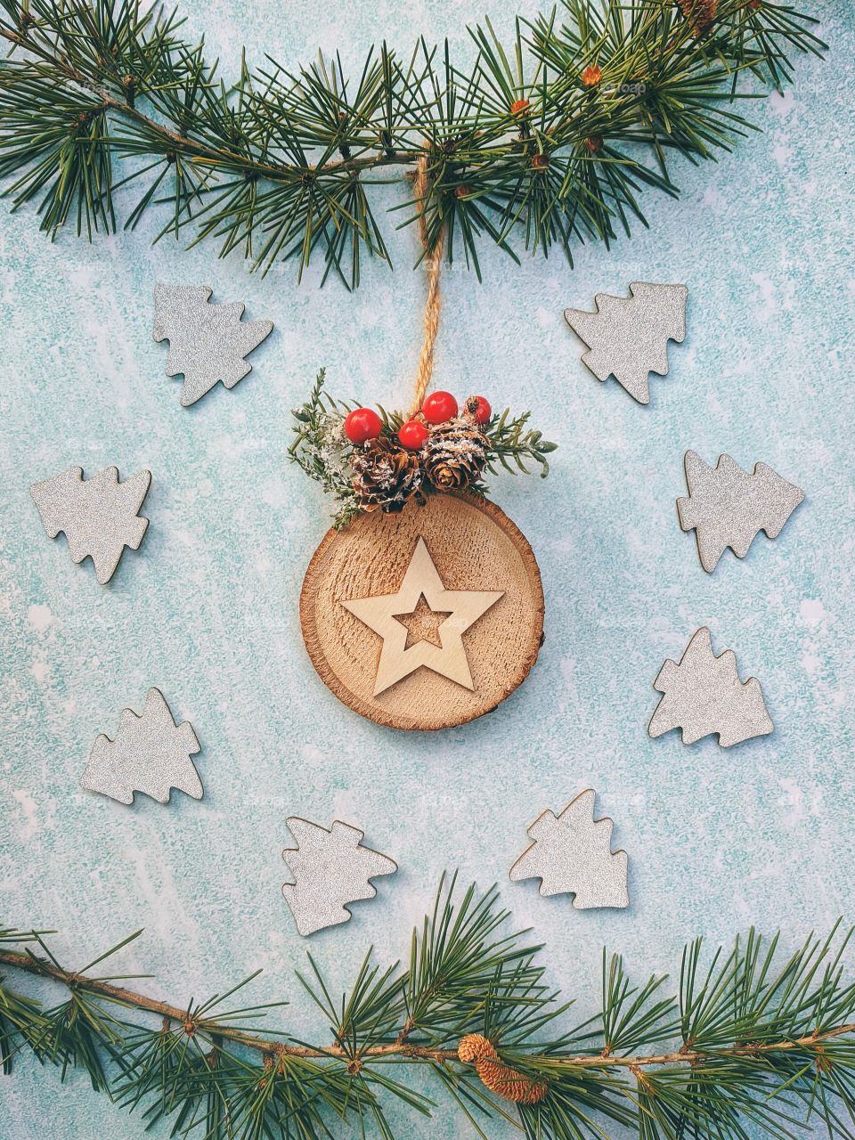 Christmas festive background with spruce branches and Christmas decorations close up. Flat lay. Top view.