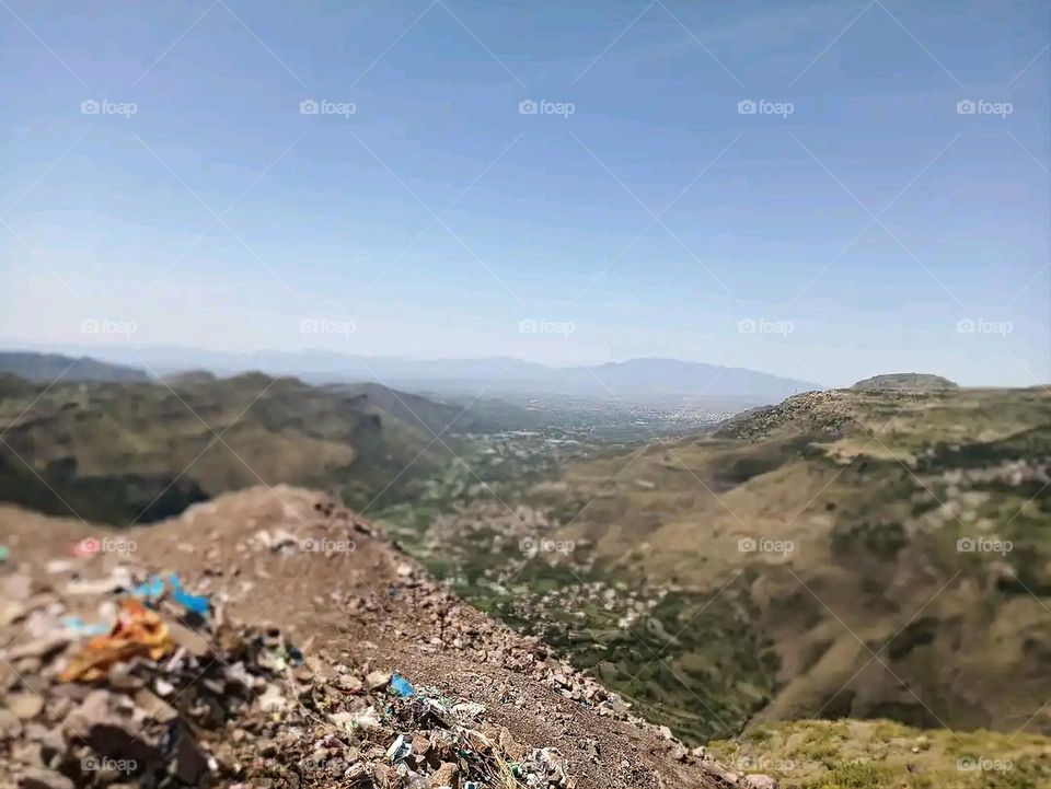 Glory be to God, the magnificent and picturesque view and the natural green trees are a view that is nothing more wonderful than it