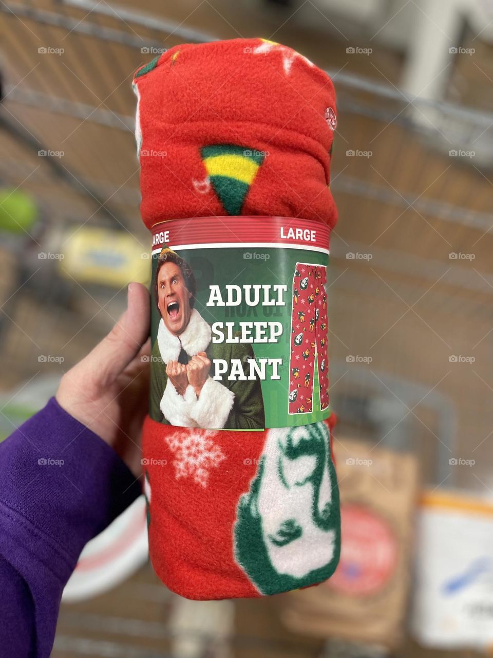 Buying a white elephant gift, shopping in the grocery store, buying a funny Christmas gift, buying a white elephant gift in Kroger, Elf adult sleep pants, fuzzy pajama pants 