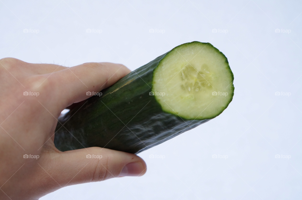 food hand cucumber h by lexlebeur