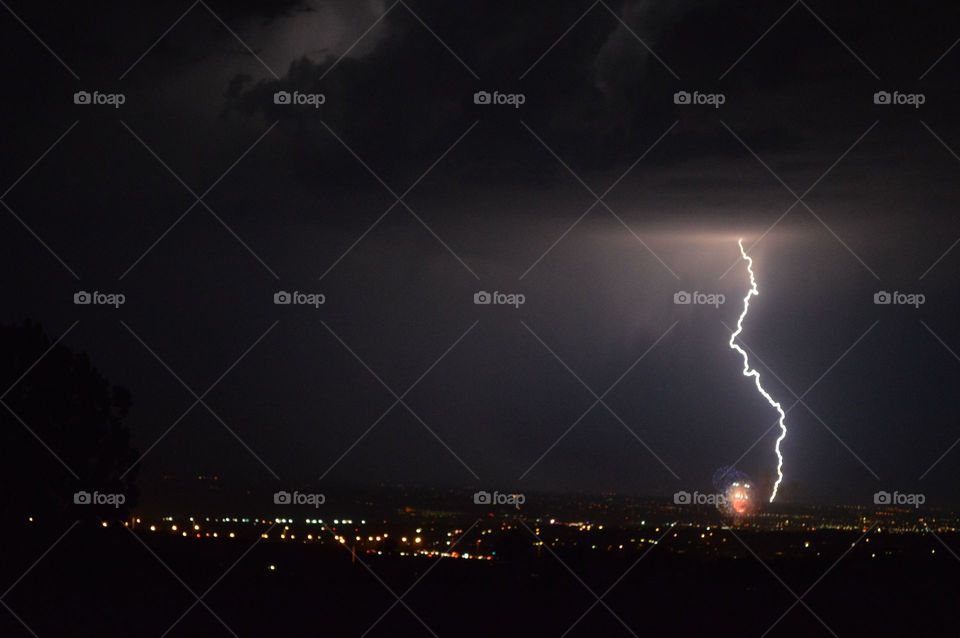 Lightning strike over 4th of July fireworks in Albuquerque, New Mexico