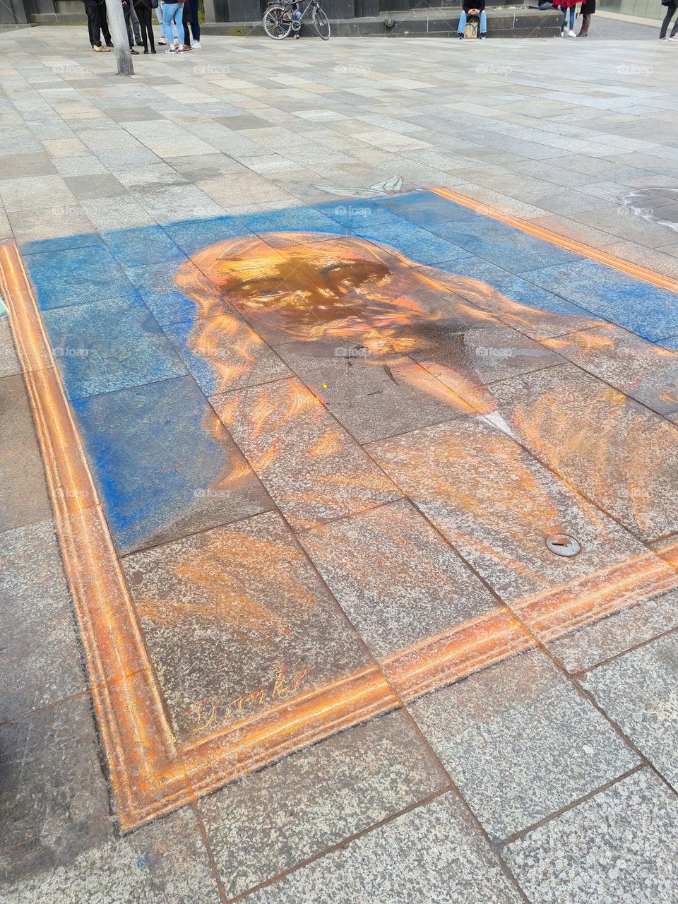 Here is some street art that was made out of chalk by an elderly men. But sadly it was ruined by society.