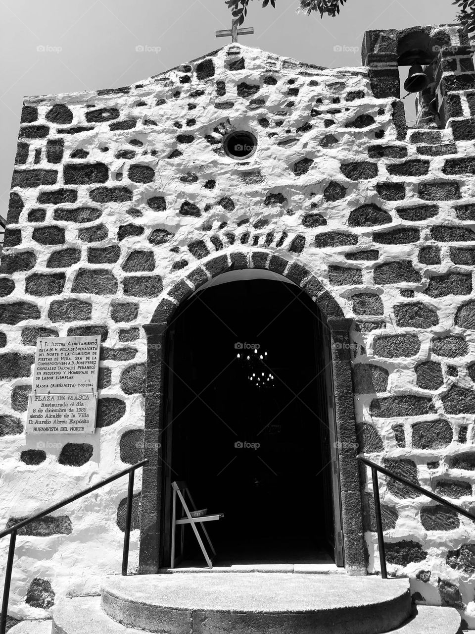 stone facade of an old church in Spain