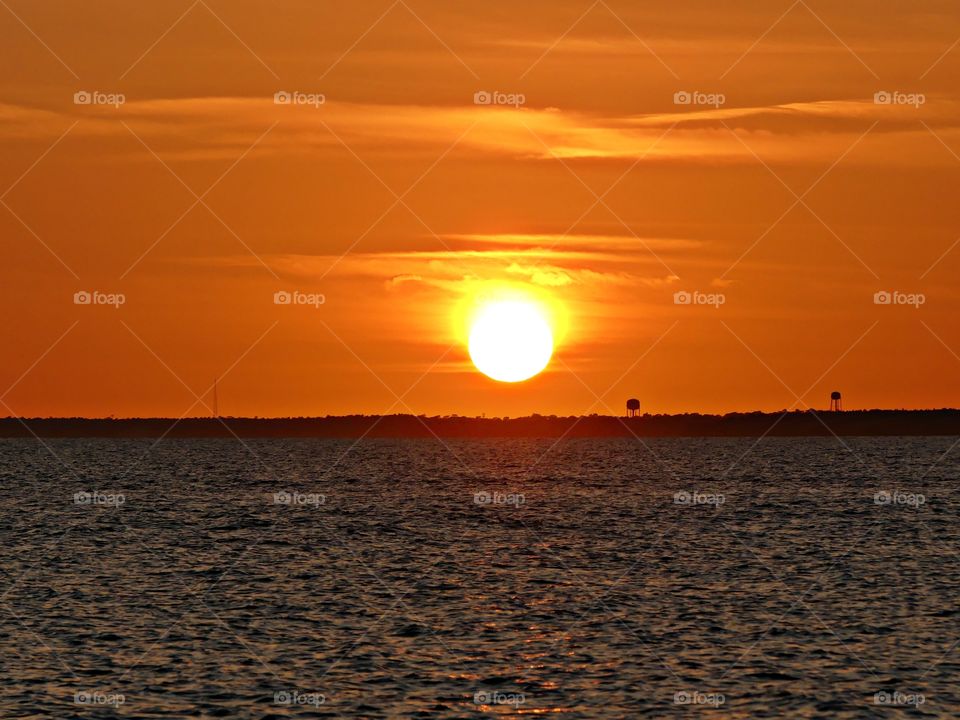 
The big orange ball slowly going down and down and it sets into the horizon making the sky absolutely stunning. 