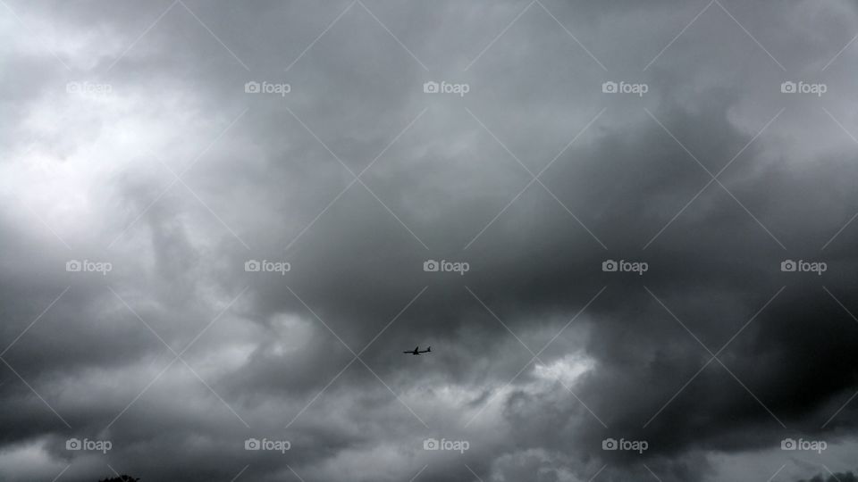 Airplane flying through storm