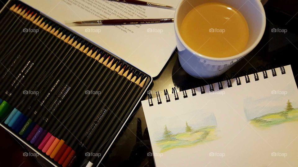 Watercolor pencil drawing in the morning with a cup of coffee.