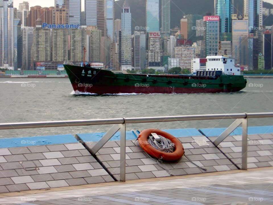 Life Preserver. Freight Boat Heading to Sea