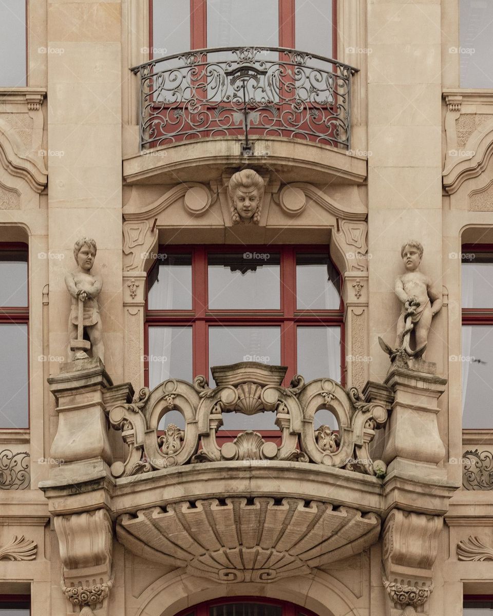 a beautifully decorated balcony of a tenement house