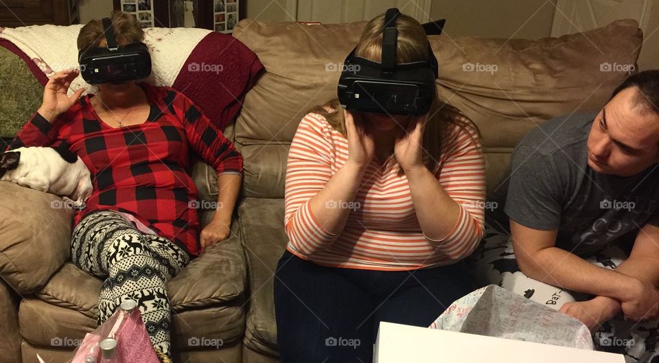 People wearing virtual reality glasses