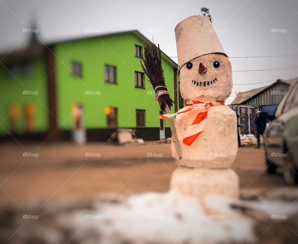 Snowman in a city