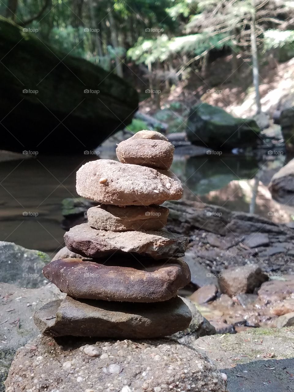 Stone stacking on the river