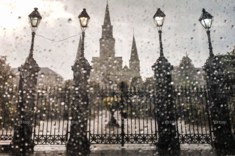 Sometimes traffic back ups is a good thing. I was stopped in my car perfectly placed in front of Jackson Square in the French Quarter on one of our many rainy days here in NOLA . Snapped this from inside my car while I waited.