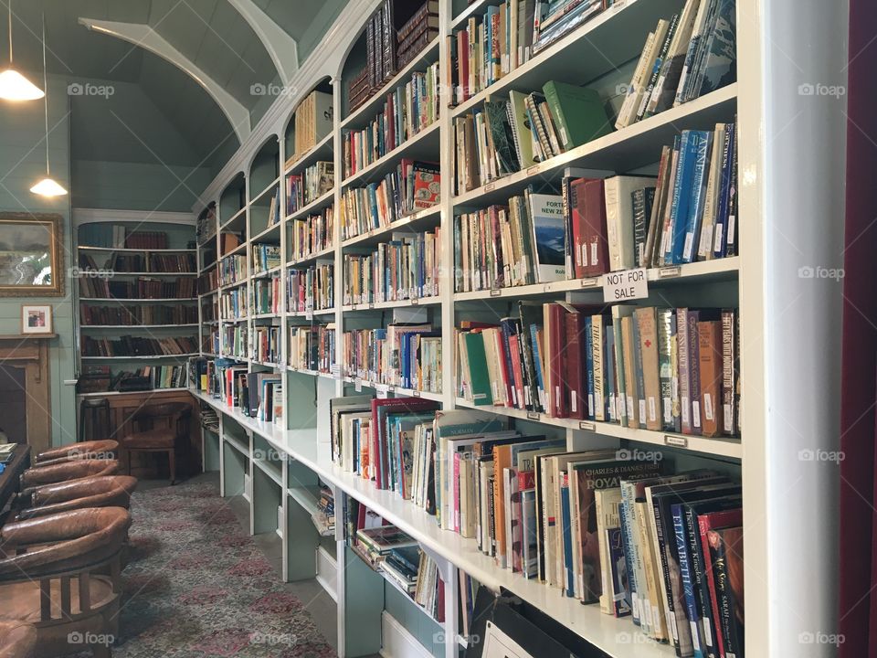 Bookshelves lining library 