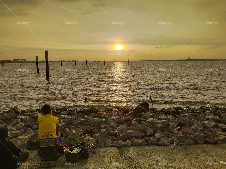 Fishing in the sunset.