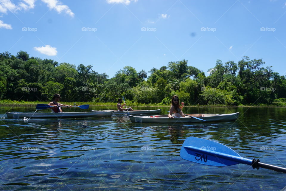 Summer fun kayaking down the river 