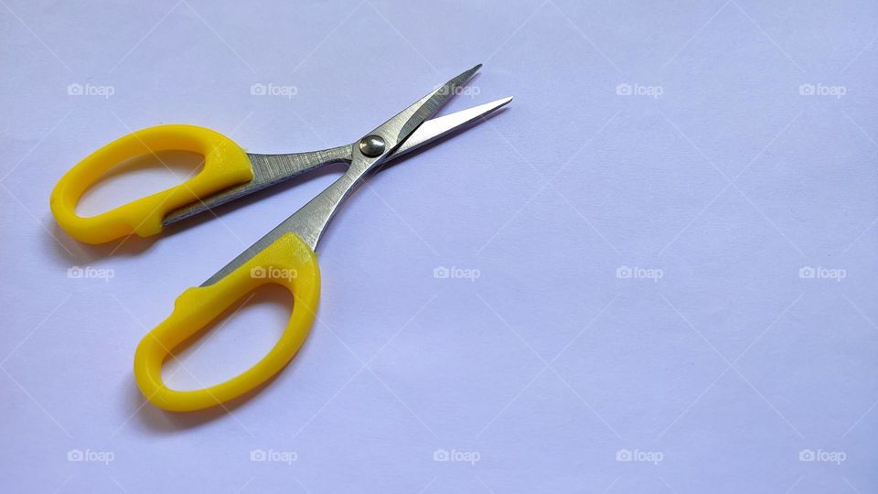 A stainless steel scissors can be used for all your daily requirements for cutting various things.