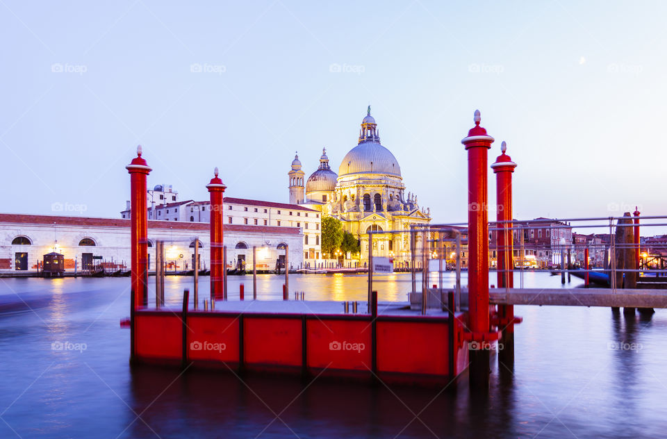 Venice at dawn. Beautiful cityscape by canal in Venice after sunset, Italy