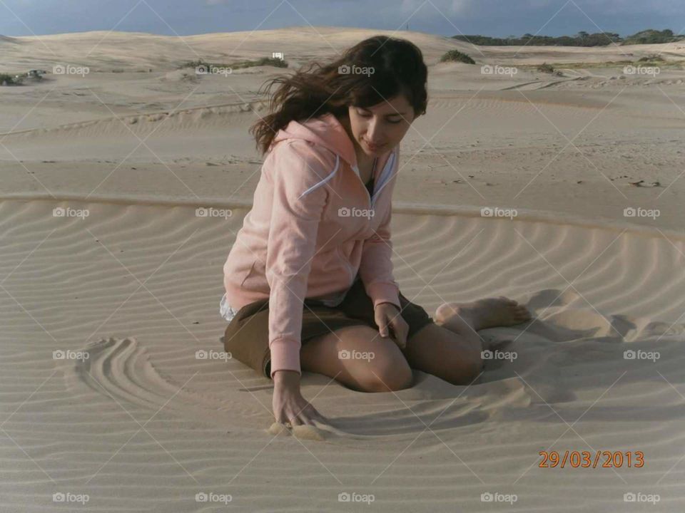 Lady on sand