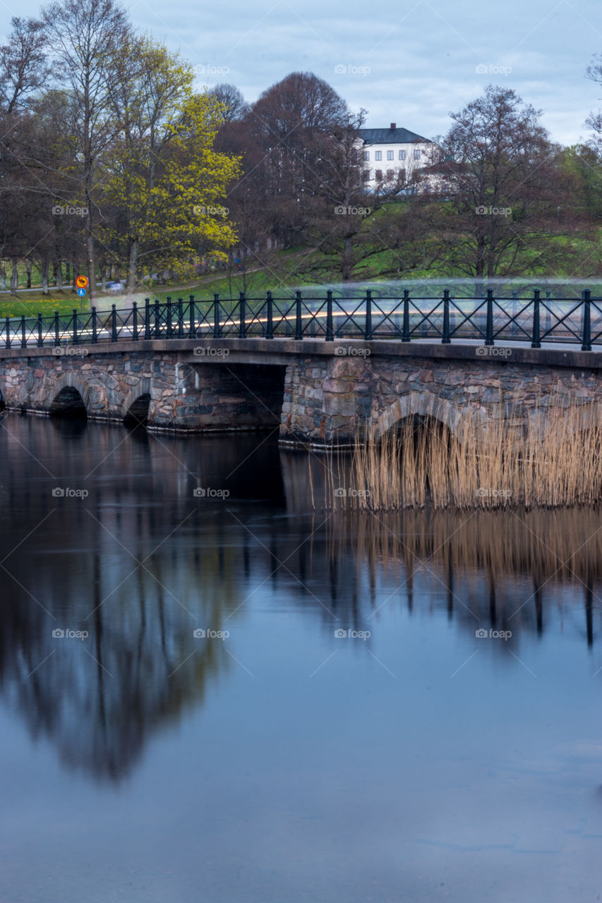 the bridge and river at Nääs Slott in Sweden getting a magical look through long exposure photography