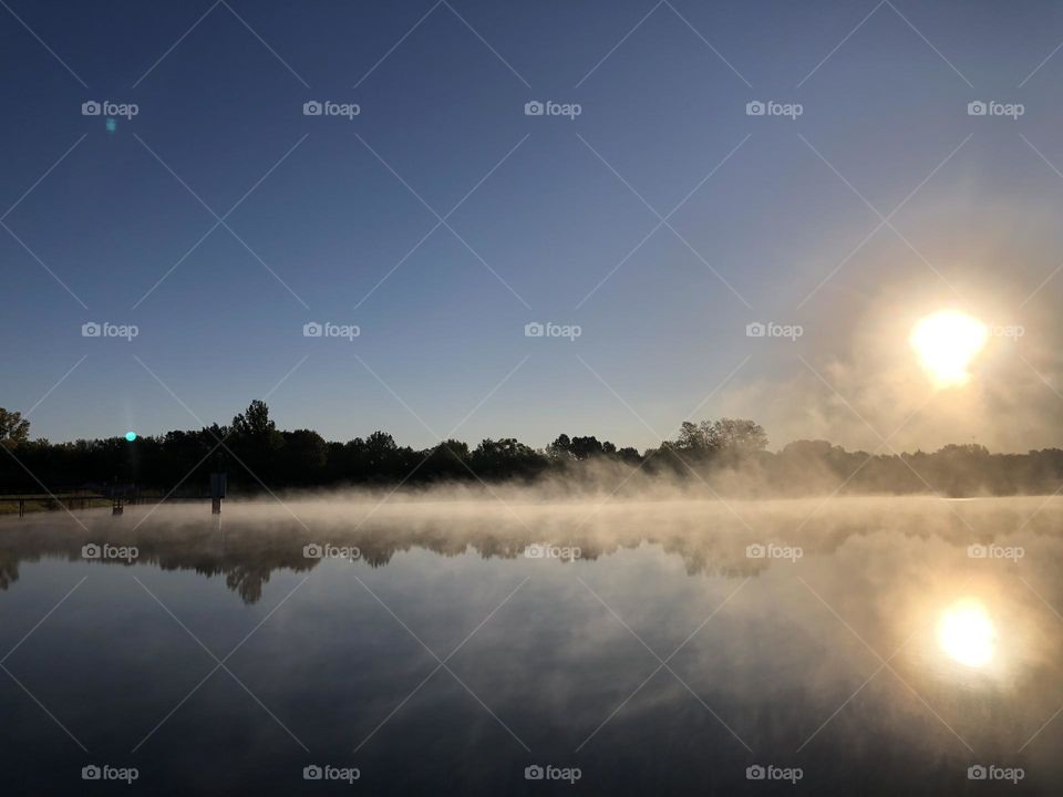 Spooky Foggy October Lake in the morning 