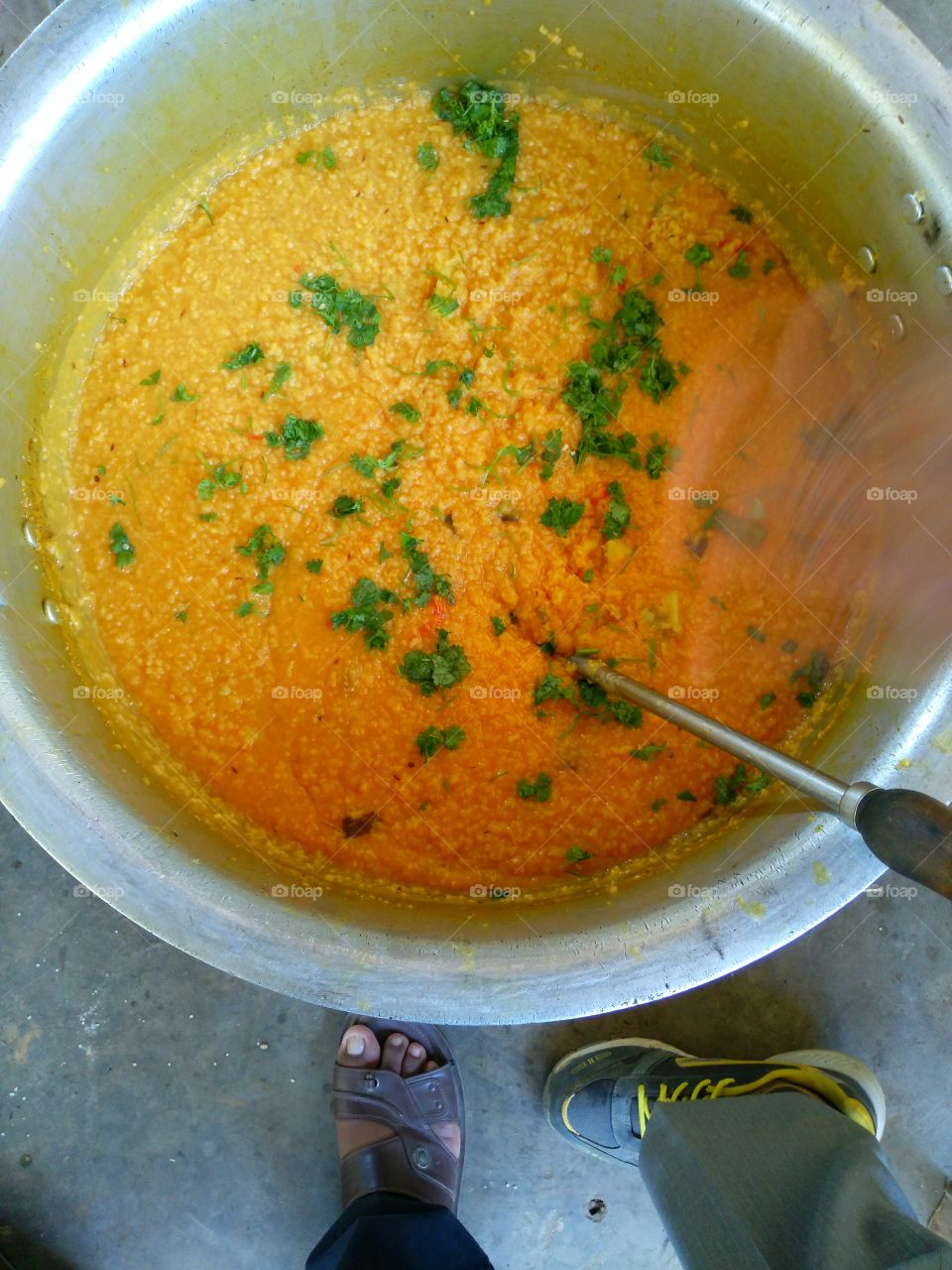 rice cooking with yellow colour