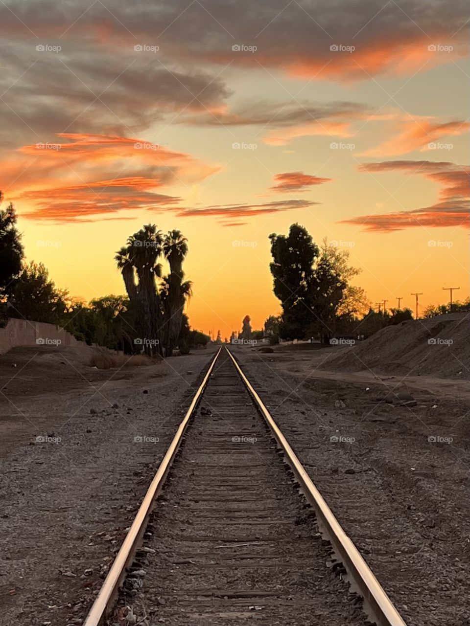 Evening sky over train tracks
