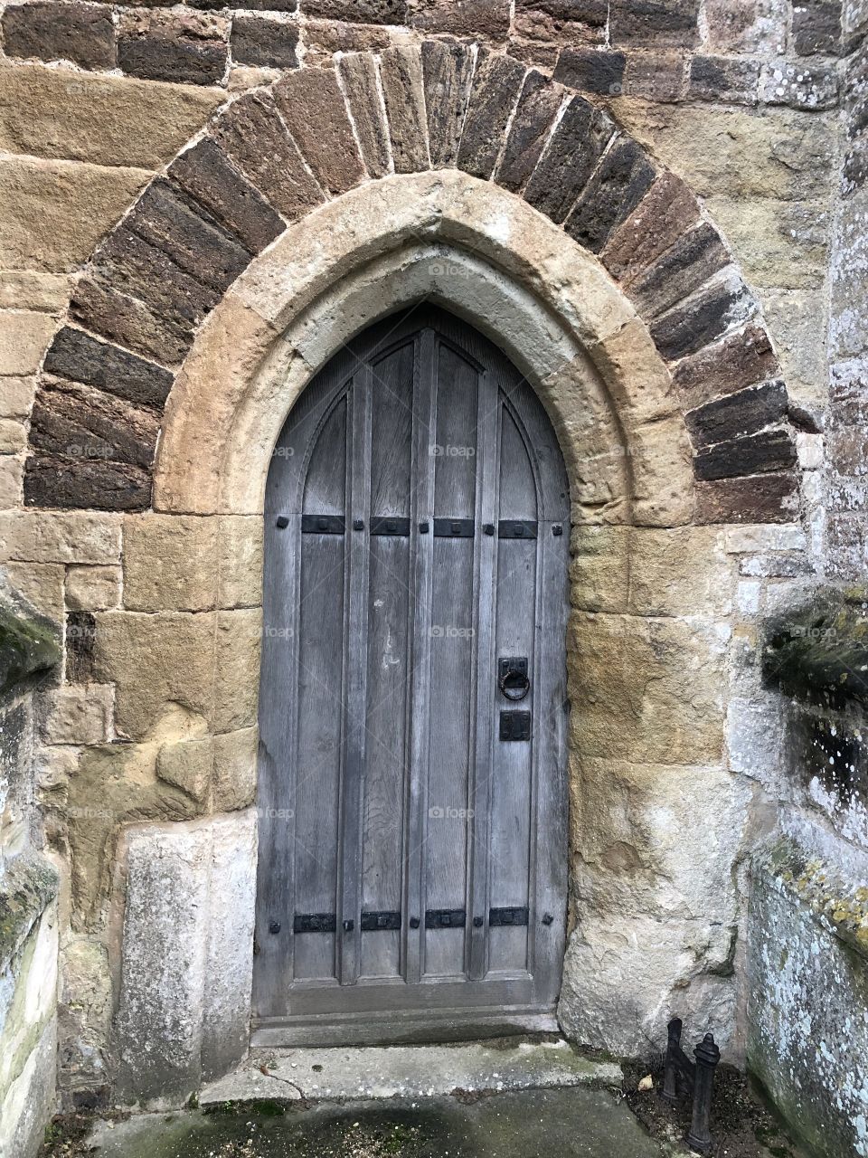 One of two of some of the side entrances of this impressive Devon, UK church.