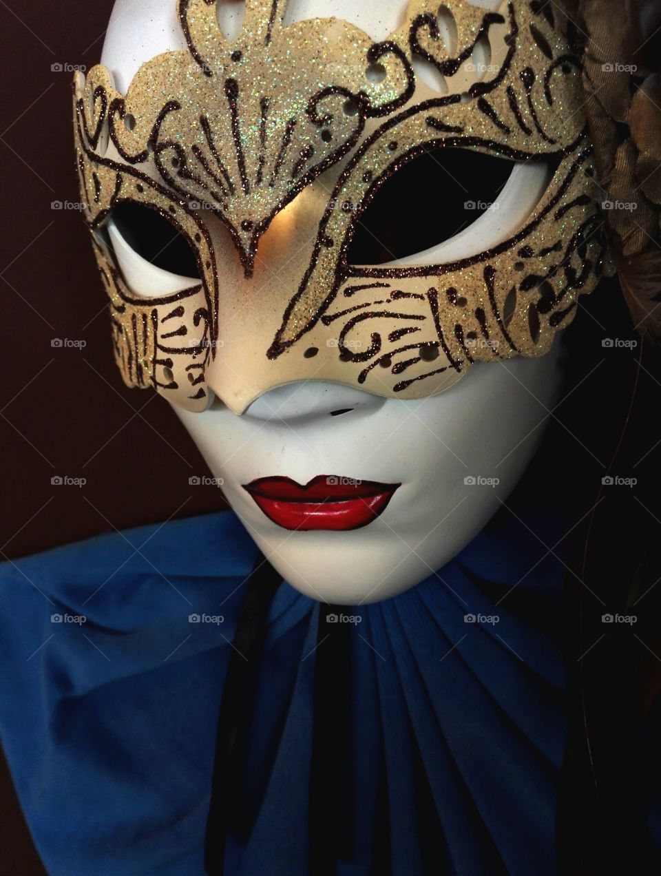 carnival mask with red lips closeup