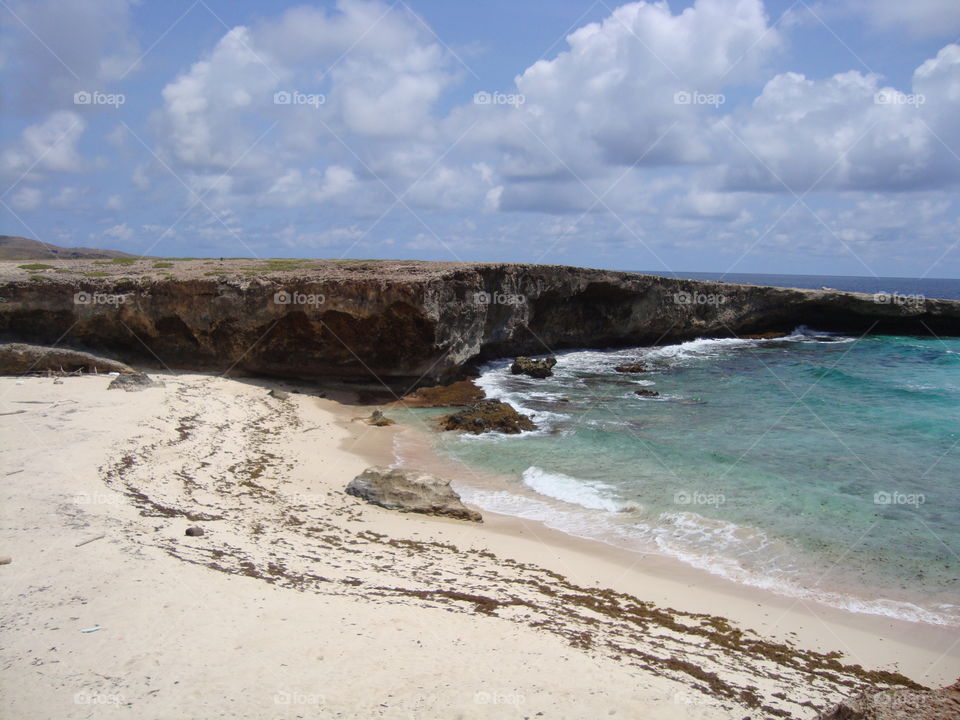 Wild beach. this photo was taken in Aruba island. this is a beach that stay in Arikok Park.