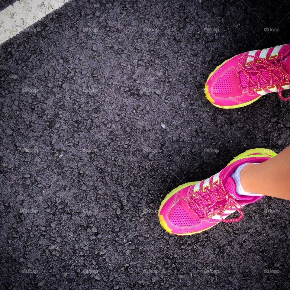 Pink shoes on track 