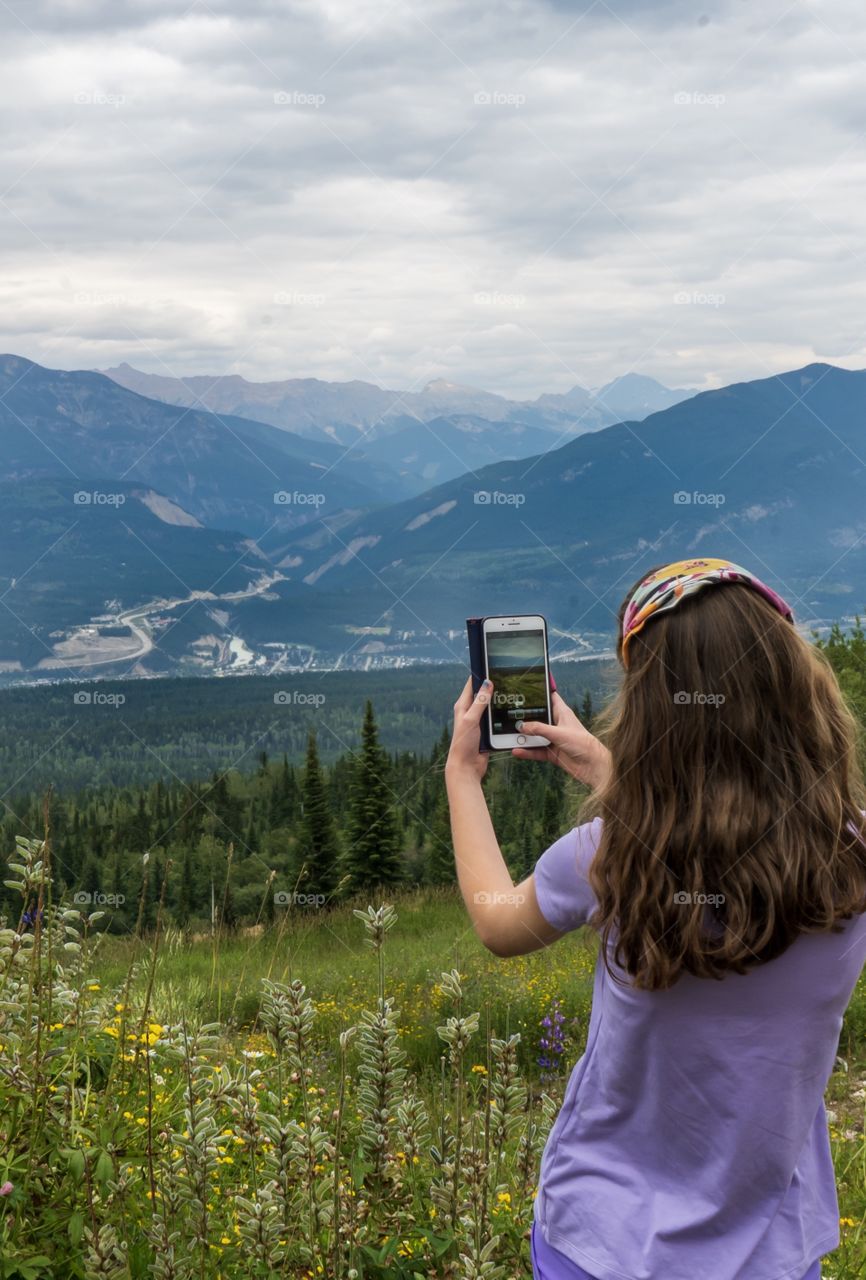 Taking iPhone landscape photos on a ski hill