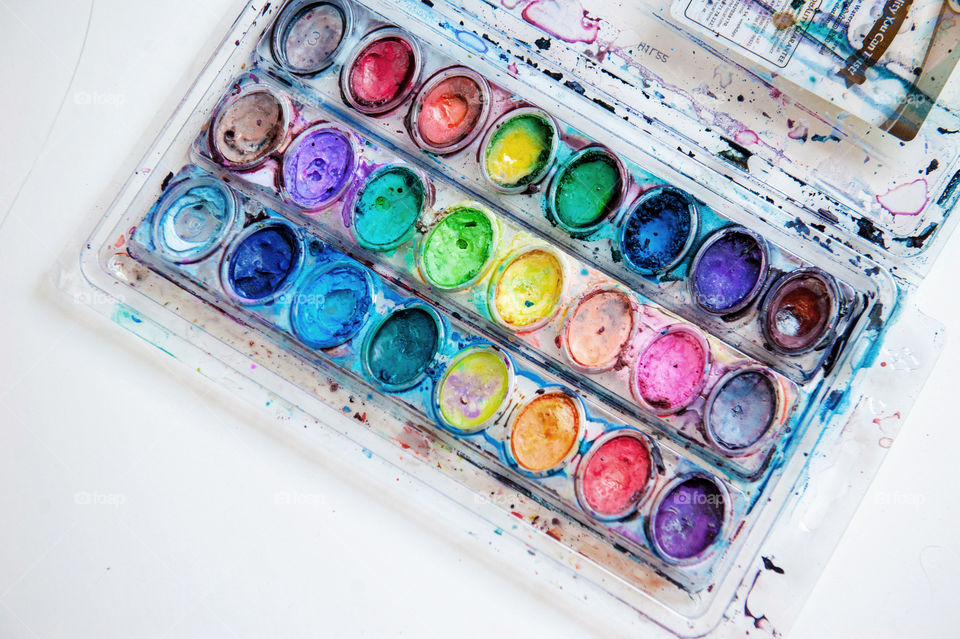 Watercolor palette, art supplies, colorful paint 