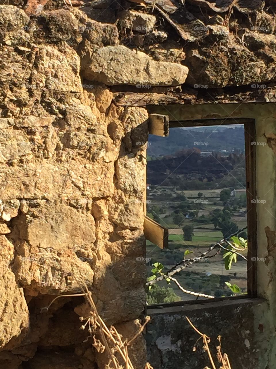 Belmonte view through old wall window