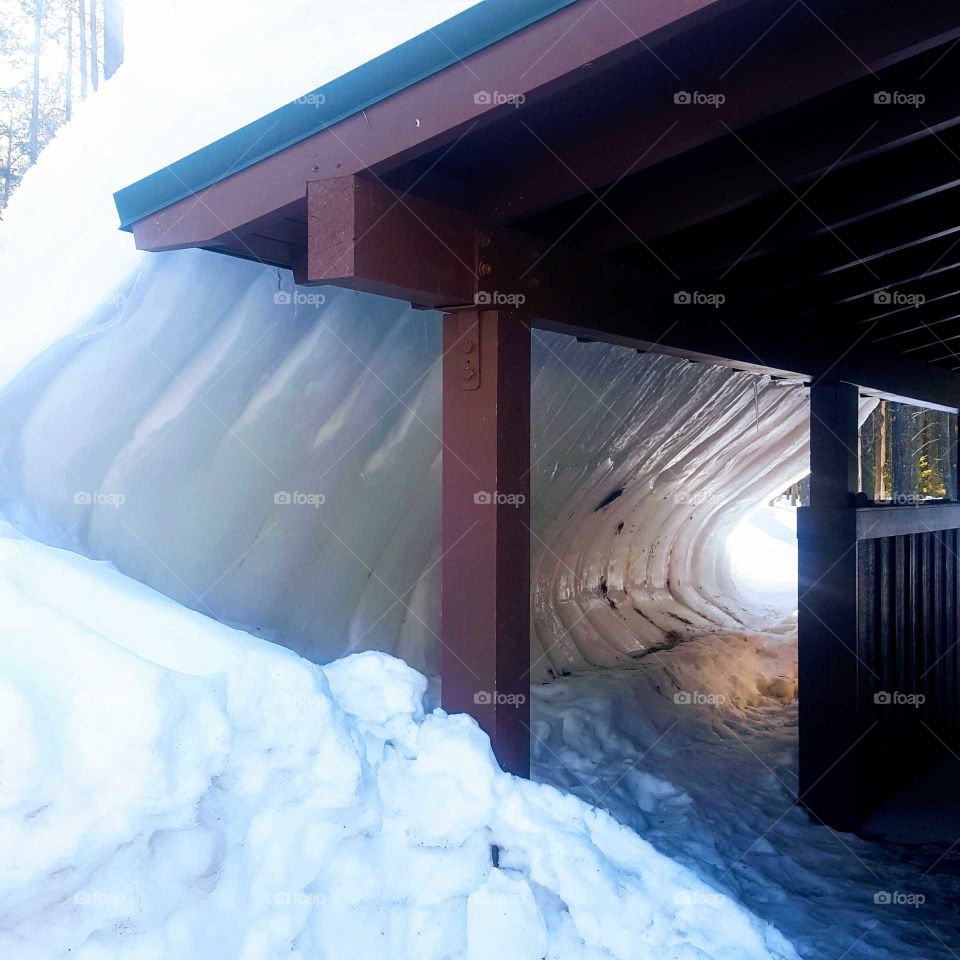 Deep snow sliding off roof