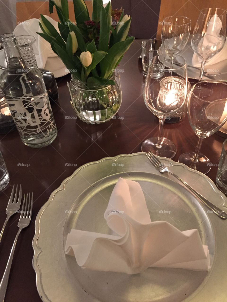 Candle light dinner - decorated table in a beautiful restaurant 