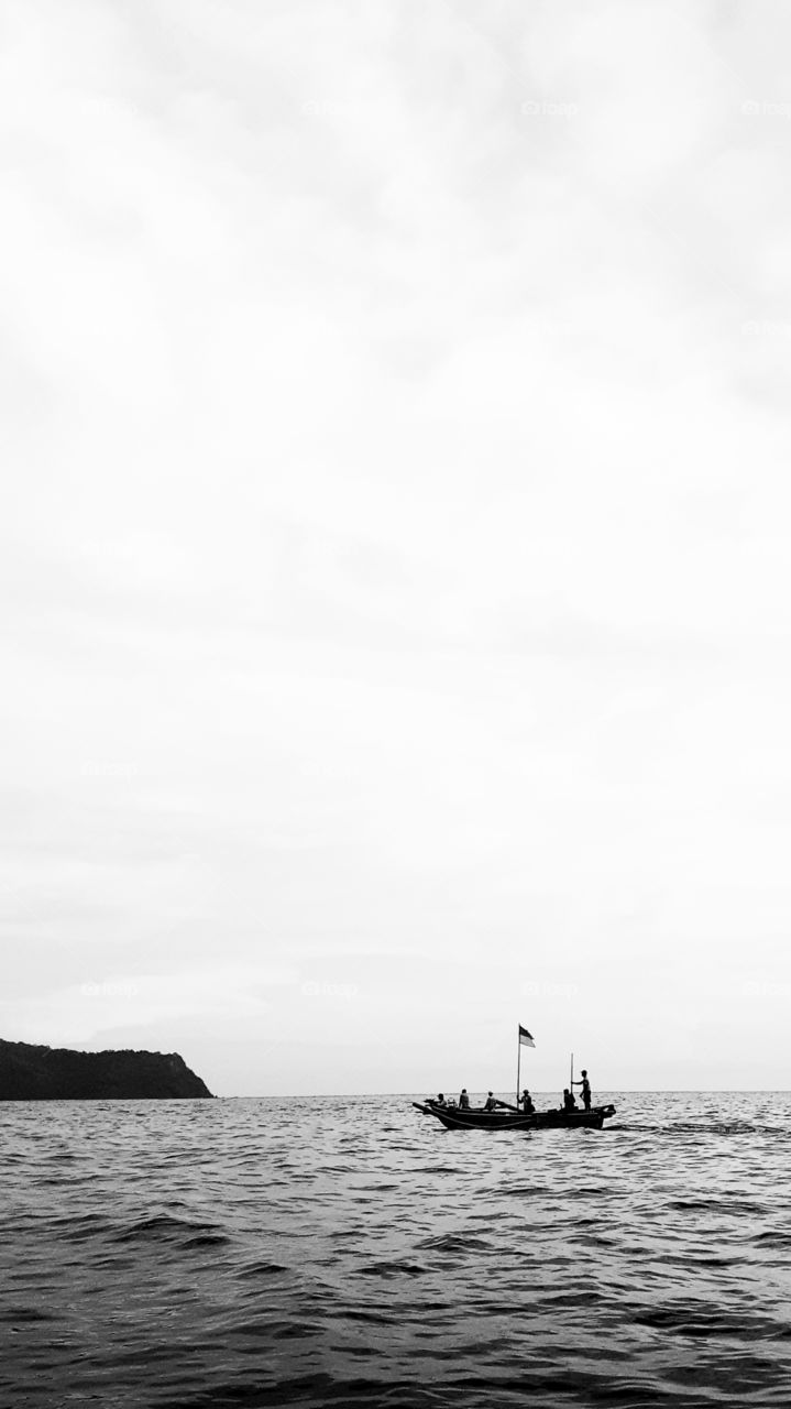 The strong sailors are enjoying their adventure.