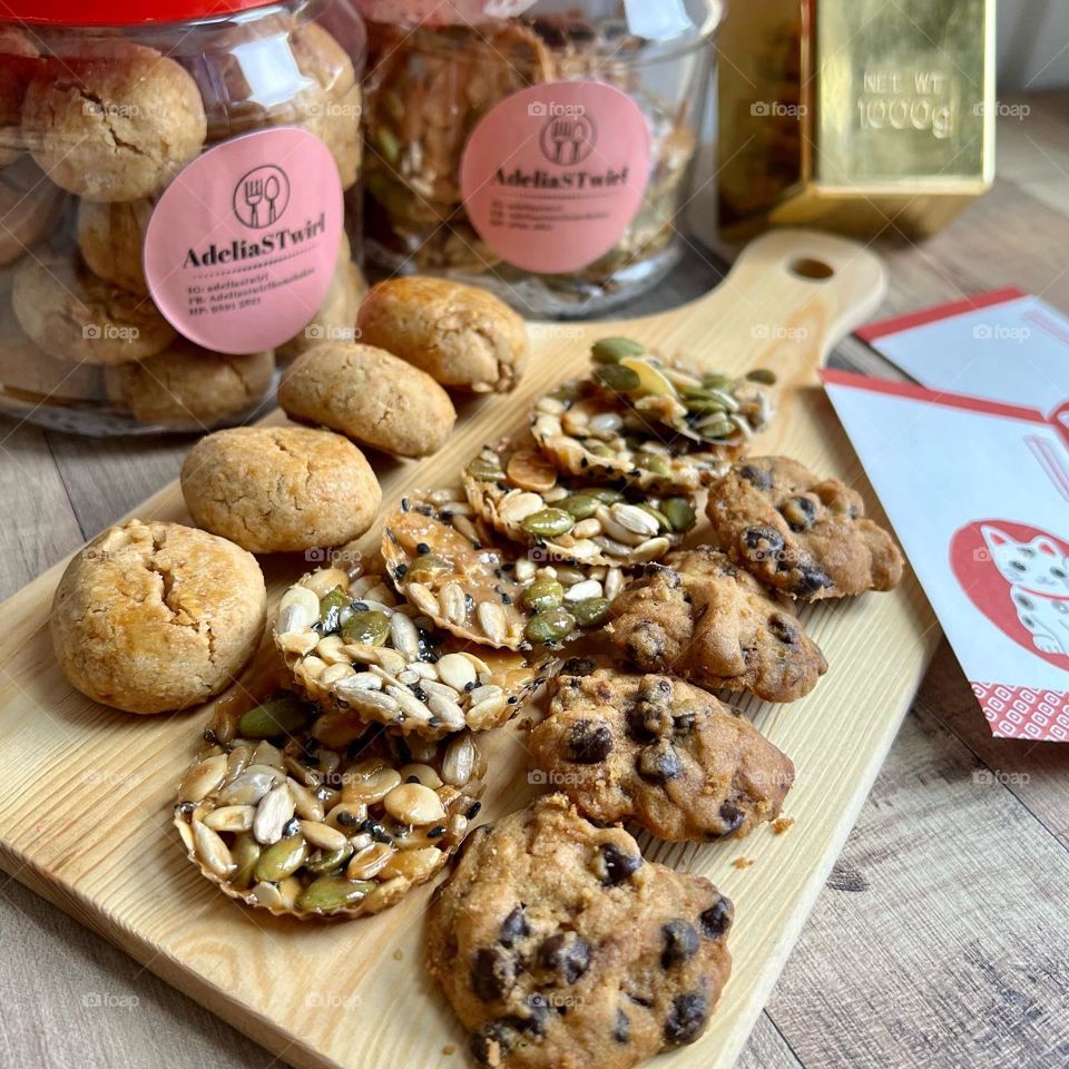 Chinese New Year homemade cookies in florentine , peanut cookies and chocolate chips cookies